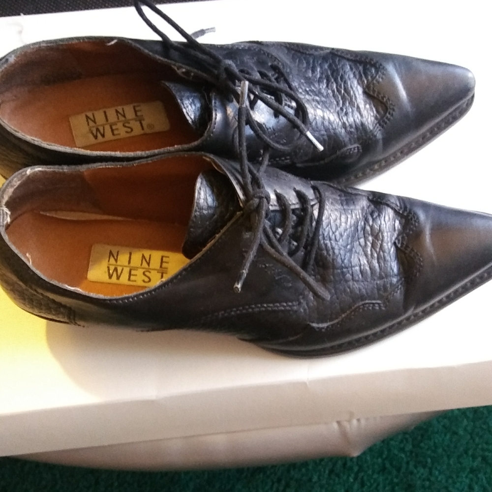 String up wing tips boot shoes.